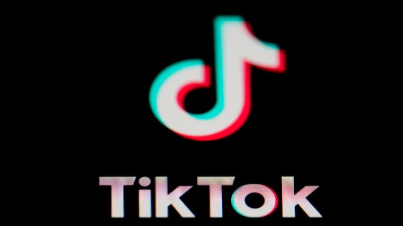 FILE - The icon for the video sharing TikTok app is seen on a smartphone, Feb. 28, 2023, in Marple Township, Pa. The Federal Trade Commission has referred a complaint against TikTok and its parent company, ByteDance, to the Department of Justice. (AP Photo/Matt Slocum, File)