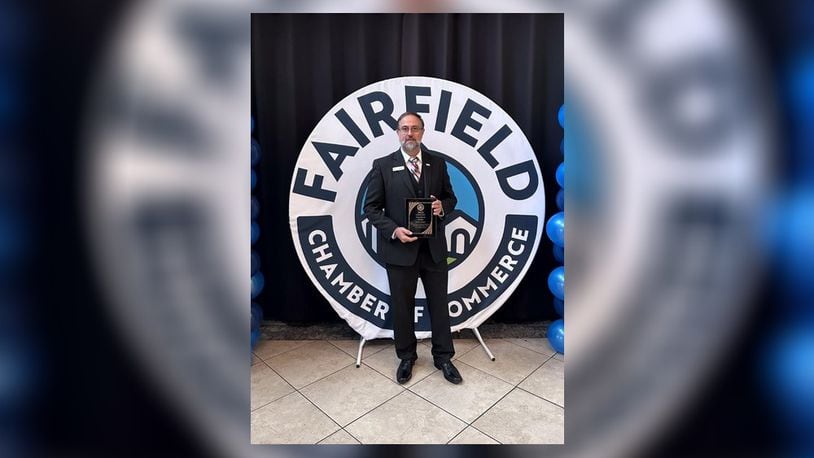 Scott Clark, a father of three Fairfield school children, is a district manager with First Financial Bank and was recently named volunteer of the year by the Fairfield Chamber of Commerce. CONTRIBUTED