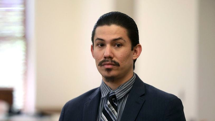 FILE - Anthony Martinez watches as the jury members leave the courtroom on Thursday, May 23, 2024, in Flagstaff, Ariz., after the jury found Martinez guilty of all charges including first-degree murder in the 2020 starvation death of his 6-year-old son. A Coconino County judge sentenced Martinez, 28, on Friday, June 28, to life in prison on the murder conviction, with additional prison sentences linked to child abuse and kidnapping convictions in the abuse of the deceased child and an older sibling. (Jake Bacon/Arizona Daily Sun via AP, File)