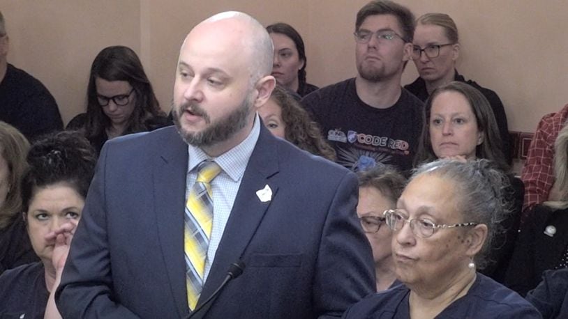 Rick Lucas, president and executive director of the Ohio Nurses Association, and Jacinta Tucker, another member of the Ohio Nurses Association, testifying before the Ohio House Public Health Policy Committee in favor of a bill for hospital safety. COURTESY OF THE OHIO CHANNEL