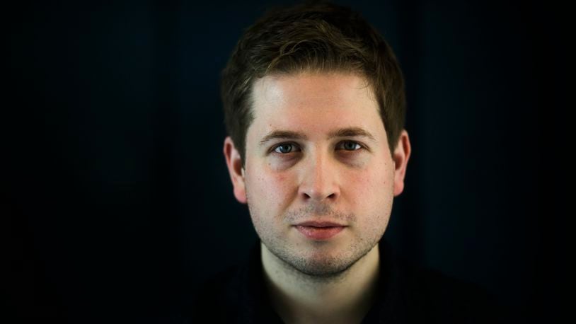 FILE - In this Feb. 14, 2018 photo, Kevin Kuehnert, leader of Social Democratic Party's, SPD, youth organization JUSOS poses for a portrait after an interview with the Associated Press at the party's headquarters in Berlin. (AP Photo/Markus Schreiber, file)