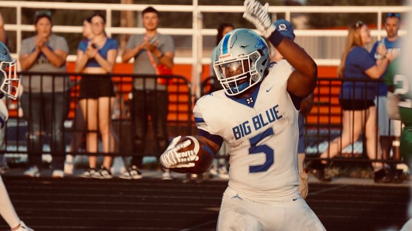 Hamilton's Gracen Goldsmith (5) celebrates after scoring a touchdown against Badin on Saturday night at Fairfield Alumni Stadium. Chris Vogt/CONTRIBUTED