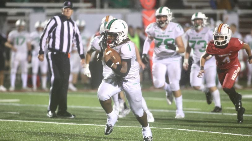 Badin's Lem Grayson runs for a touchdown against Bishop Fenwick on Friday, Sept. 27, 2024, at Bishop Fenwick in Franklin. David Jablonski/Staff