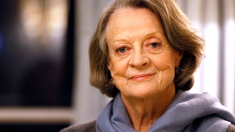 FILE - British actress Dame Maggie Smith poses in London on Dec. 16, 2015. (AP Photo/Kirsty Wigglesworth, File)