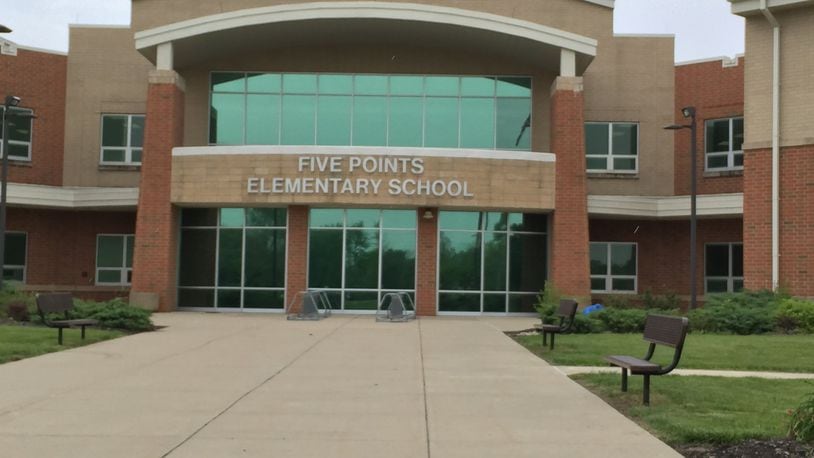 A section of Lytle- Five Points Road in front of Five Points Elementary School has now been repaired following a two-day closure. FILE PHOTO