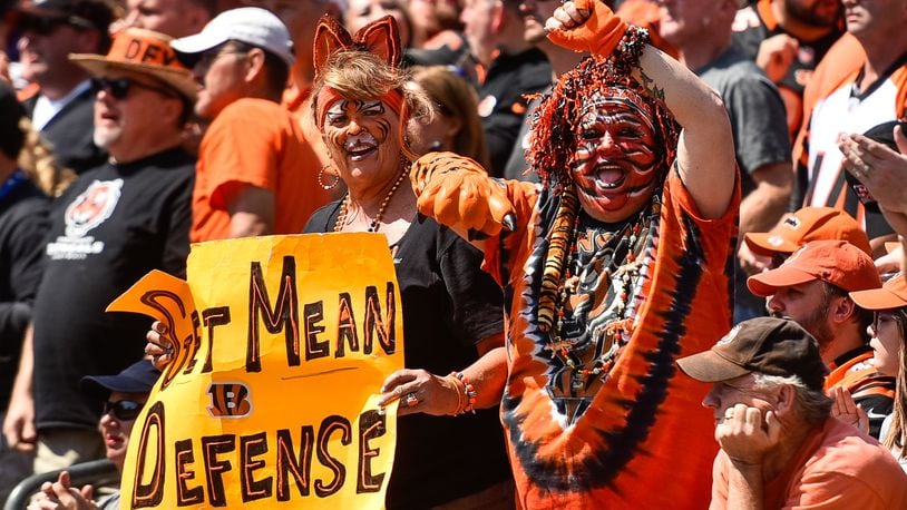 Fans cheer on the Bengals during their game against the Baltimore Ravens at Paul Brown Stadium in Cincinnati. NICK GRAHAM/STAFF