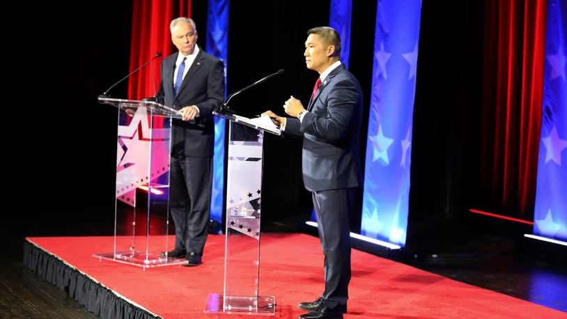 U.S. Sen. Tim Kaine of Virginia , left, debates Republican challenger Hung Cao at Norfolk State University in Norfolk, Va., on Wednesday Oct. 2, 2024. (Nextstar/WAVY-TV via AP, Pool)