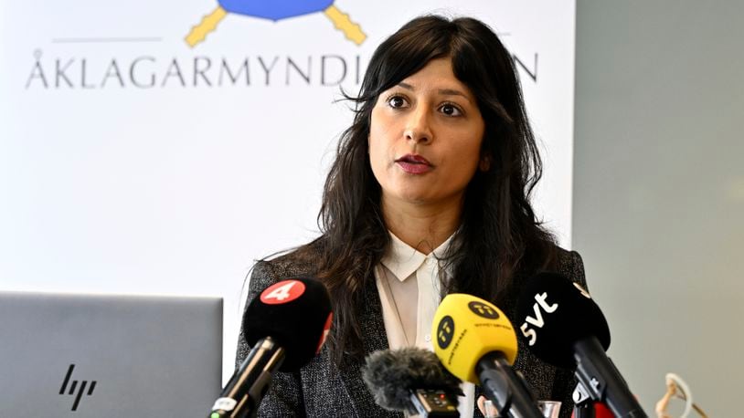 Prosecutor Reena Devgun speaks during a press conference regarding the indictment of a 52-year-old woman, associated with the Islamic State group, with genocide, crimes against humanity and serious war crimes against Yazidi women and children in Syria, in Stockholm, Thursday, Sept. 19, 2024. (Anders Wiklund/TT News Agency via AP)