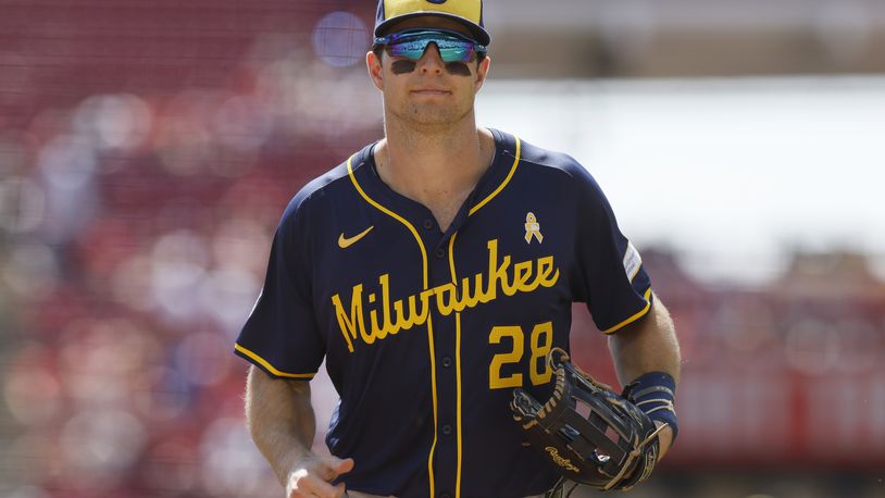 Milwaukee Brewers right fielder Brewer Hicklen runs off the field against the Cincinnati Reds during the third inning of a baseball game Sunday, Sept. 1, 2024, in Cincinnati. (AP Photo/Jay LaPrete)