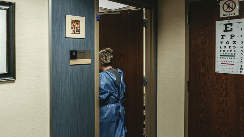 AP FILE - A health care worker at the Park Nicollet Gender Services Clinic that provides medical treatment including puberty blockers in Minneapolis, June 6, 2023. Laws in more than 20 states have left the fate of clinics in doubt and families with transgender children searching for medical care across state lines. (Jamie Kelter Davis/The New York Times)