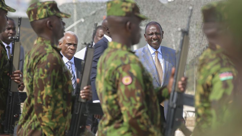 Kenya's President William Ruto, right, and Transition Council President Edgard Leblanc, arrive to the Kenyan base in Port-au-Prince, Haiti, Saturday, Sept. 21, 2024. (AP Photo/Odelyn Joseph)