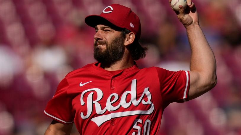 Cincinnati Reds pitcher Sam Moll throws during the third inning of a baseball game against the Houston Astros, Monday, Sept. 2, 2024, in Cincinnati. (AP Photo/Carolyn Kaster)