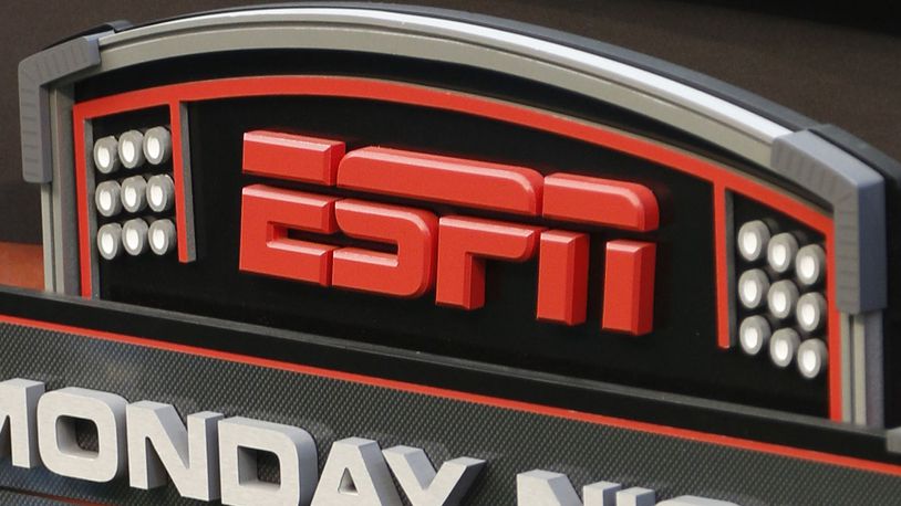 FILE - The ESPN logo is seen, Sept. 16, 2013, prior to an NFL football game between the Cincinnati Bengals and the Pittsburgh Steelers in Cincinnati. (AP Photo/David Kohl, File)