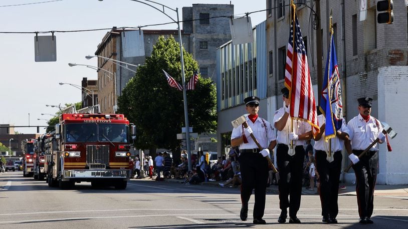 Middletown held its Fourth of July parade this year with the route running from Smith Park to Woodside Cemetery. Middletown Division of Fire Honor Guard marches in the parade. NICK GRAHAM/STAFF