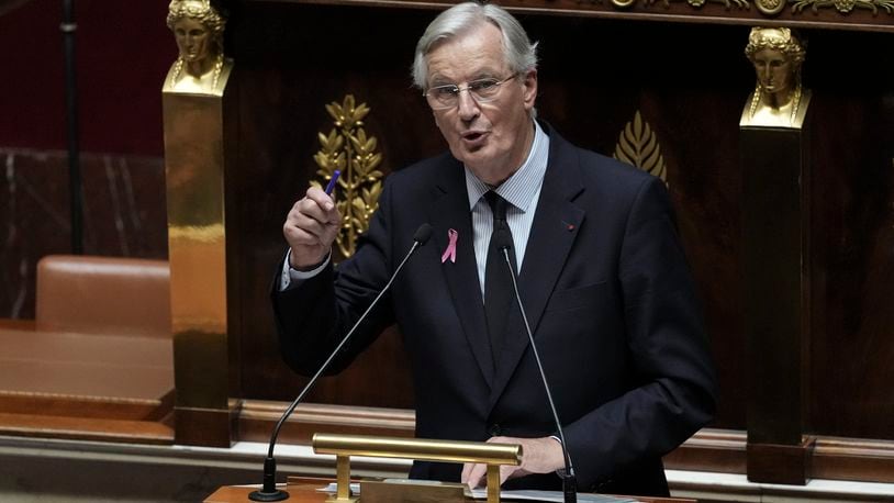 France's Prime Minister Michel Barnier delivers a speech at the National Assembly, in Paris, Tuesday, Oct. 1, 2024. (AP Photo/Thibault Camus)