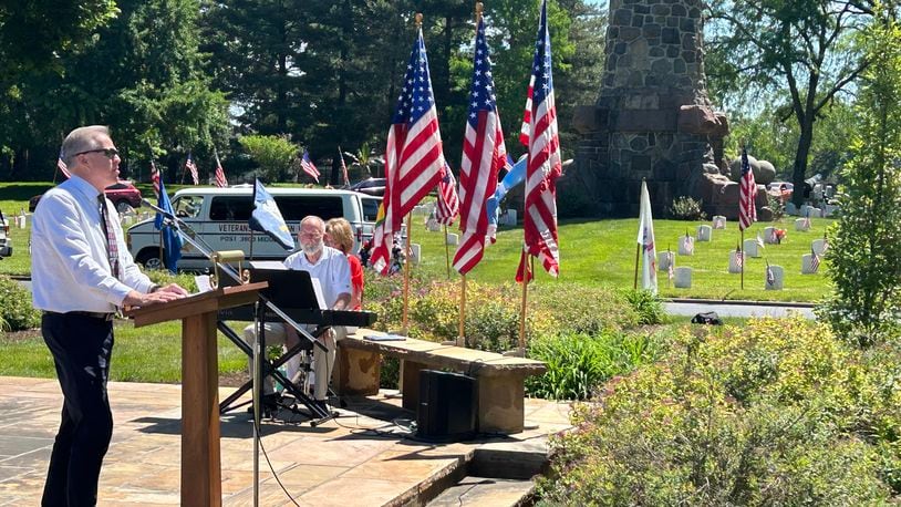 The City of Middletown announces the date and ceremony details for the annual Memorial Day Parade & Ceremony on May 27. Pictured is Middletown Municipal Court Judge James Sherron delivering the keynote address during the city's Memorial Day ceremony May 29, 2023 at Woodside Cemetery and Arboretum. RICK McCRABB/STAFF