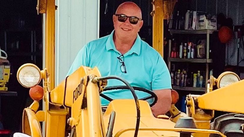 Butler County Common Pleas Judge Keith Spaeth working the family farm where he is able to apply his agriculture degree from Purdue University. SUBMITTED