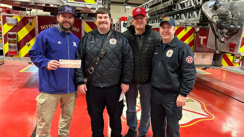 Middletown firefighters donated close to $10,000 Thursday afternoon to Middie Way Baseball, a youth program in the city. The money was generated by the annual firefighters golf outing at Wildwood Golf Club. From left, Kyle Schwarber, Lt. Mike Jones, Greg Schwarber and firefighter/paramedic Adam Stitsinger. RICK McCRABB/STAFF