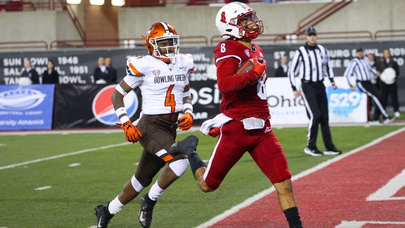 Miami wide receiver Mac Hippenhammer crosses the goal line ahead of Bowling Green's Deshawn Jones Jr. during Tuesday night's game at Yager Stadium. Miami Athletics photo