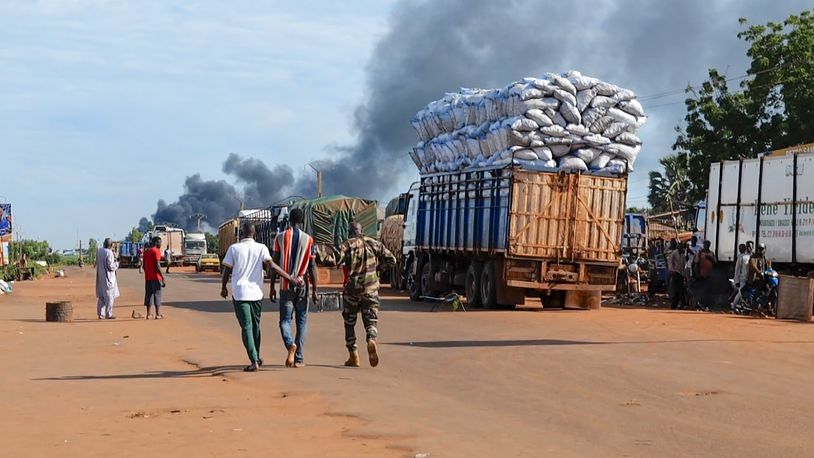 This video grab shows Malian security personnel detaining a man after Mali's army said a military training camp in the capital Bamako has been attacked early Tuesday, Sept. 17 2024. (AP Photo)