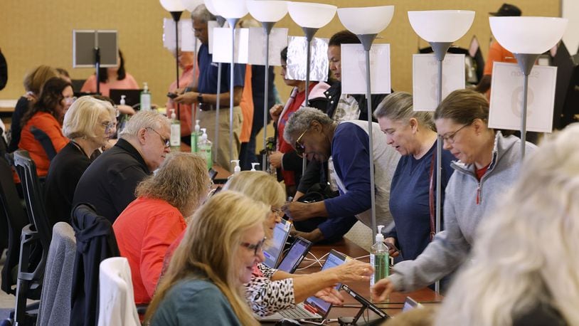 People came to vote on the first day of early voting Tuesday, Oct. 8, 2024 at Butler County Board of Elections in Hamilton. NICK GRAHAM/STAFF