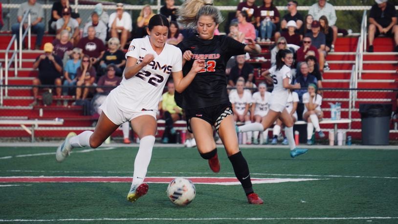 Fairfield junior Leaha Compton and Ross senior Caroline Chernock battle for possession during their game on Tuesday night at Christy Rose Dennis Memorial Stadium. Chris Vogt/CONTRIBUTED