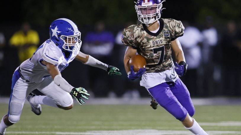 Middletown's Talan Malicote carries the ball after making a catch during their football game against Hamilton Friday, Sept. 2, 2022 at Barnitz Stadium in Middletown. Hamilton won 17-0. NICK GRAHAM/STAFF