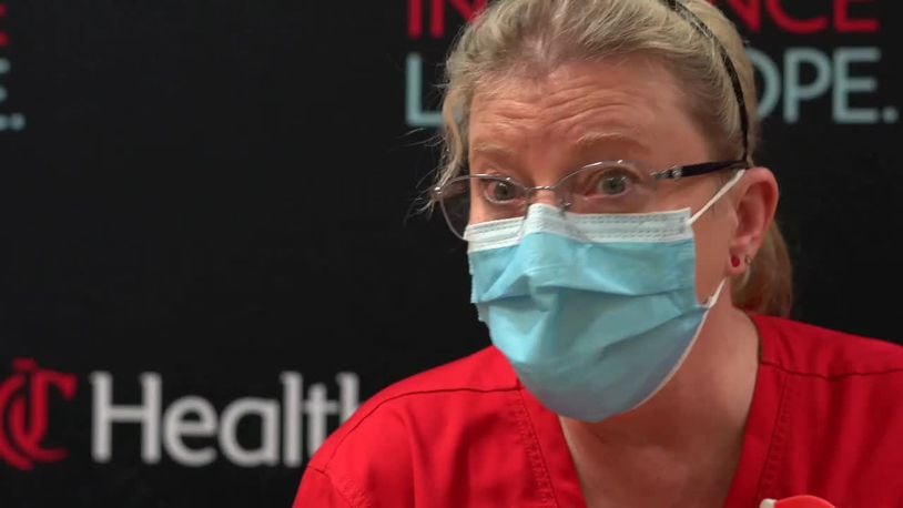 UC Health said masks must again be worn while employees are in inpatient rooms, patient exam rooms, in the registration and front desk areas, during transportation of patients, and when interacting with patients. FILE