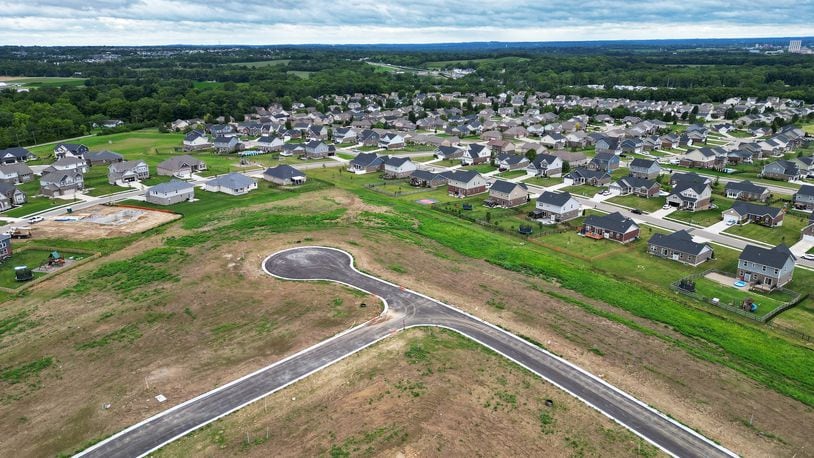 Monroe Crossings subdivision continues to expand with roads added for new houses to be built. NICK GRAHAM/STAFF