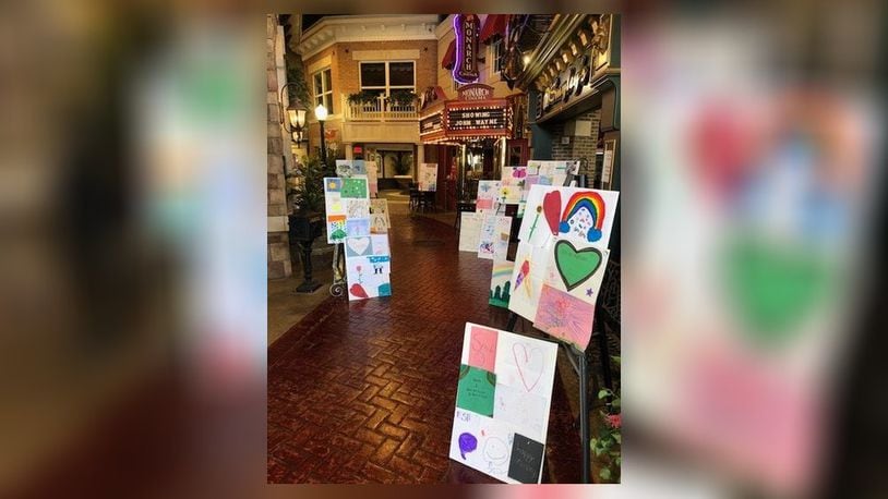 Poster boards of letters, cards and pictures from the community line Main Street inside Chesterwood Village in West Chester Twp. The residents there are enjoying seeing and reading the correspondences from the community. SUBMITTED PHOTO