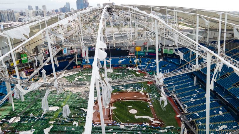 The roof of the Tropicana Field is damaged the morning after Hurricane Milton hit the region, Thursday, Oct. 10, 2024, in St. Petersburg, Fla. (AP Photo/Julio Cortez)