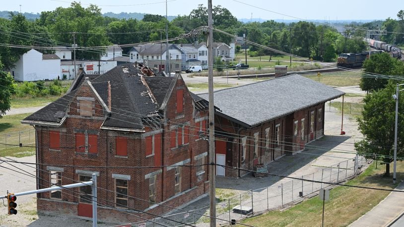 The CSX Train Depot, which was relocated north by 1,000-plus feet in December 2022 and January 2023 to the corner of Maple Avenue and Martin Luther King Jr. Boulevard. The city of Hamilton is seeking RFPs from companies to purchase and develop the property. Pictured is the depot on June 17, 2024, from the top floor of the parking garage at the corner of Maple Avenue and MLK Boulevard. MICHAEL D. PITMAN/STAFF