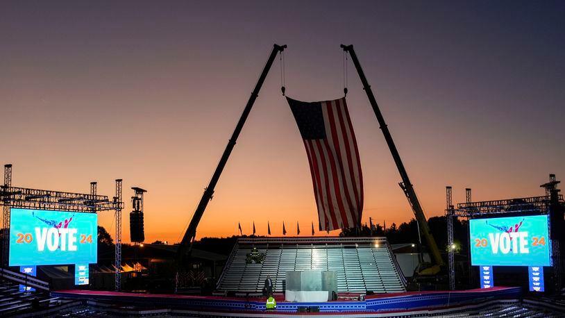 The campaign rally site is seen near sunrise before Republican presidential nominee former President Donald Trump speaks at the Butler Farm Show, Saturday, Oct. 5, 2024, in Butler, Pa. (AP Photo/Julia Demaree Nikhinson)