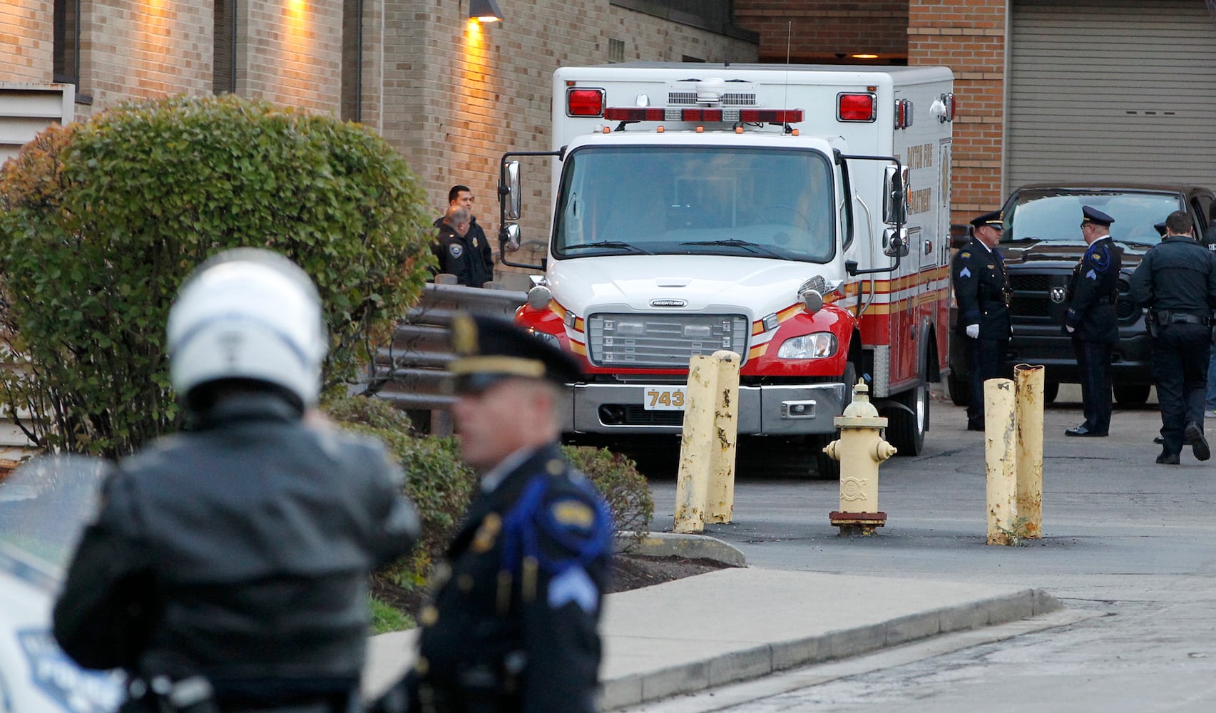 PHOTOS: People line street for fallen Dayton detective’s processional