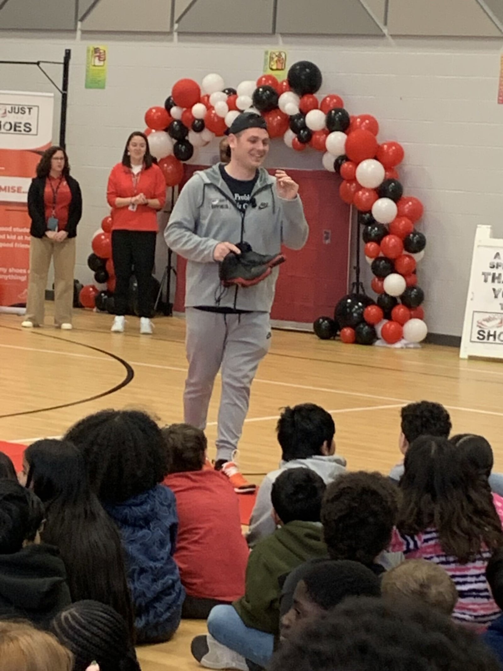 Dozens of Central Elementary students were recently surprised by Fairfield High School athletes and a local charity presented them with free shoes in a school ceremony. Matt Cline, founder of "Just A Pair Of Shoes," also gave an inspirational pep talk to the students. (Provided)