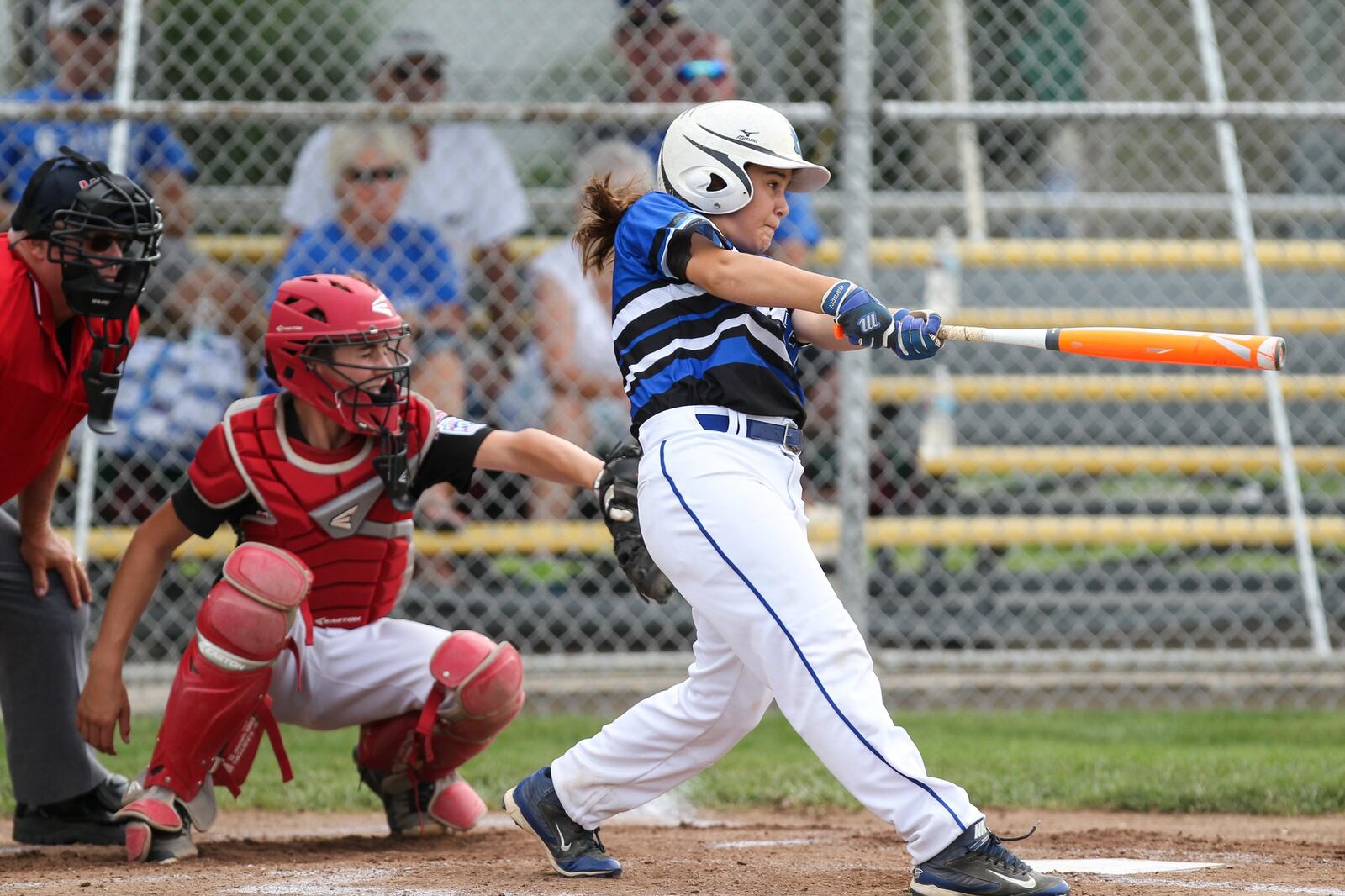 Hamilton West Side’s Jaycee Taylor takes a cut Thursday during the winners’ bracket final against Canfield in the Ohio Little League 12-year-old baseball tournament at Ford Park in Maumee. CONTRIBUTED PHOTO BY SCOTT GRAU