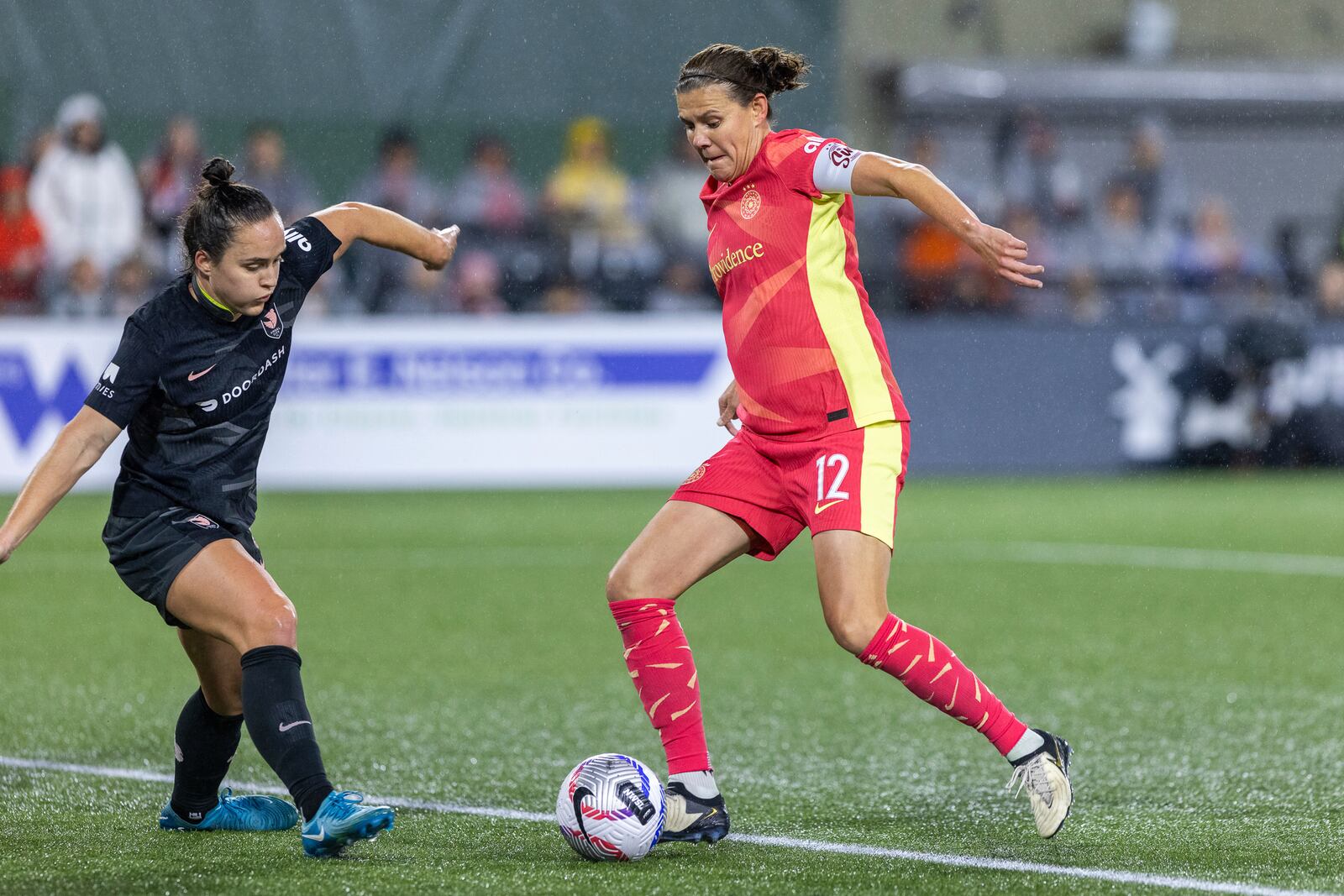 Portland Thorns forward Christine Sinclair (12) scores a goal during the first half of an NWSL soccer match against Angel City FC at Providence Park on Friday Nov. 1, 2024 in Portland, Ore. (Sean Meagher/The Oregonian via AP)