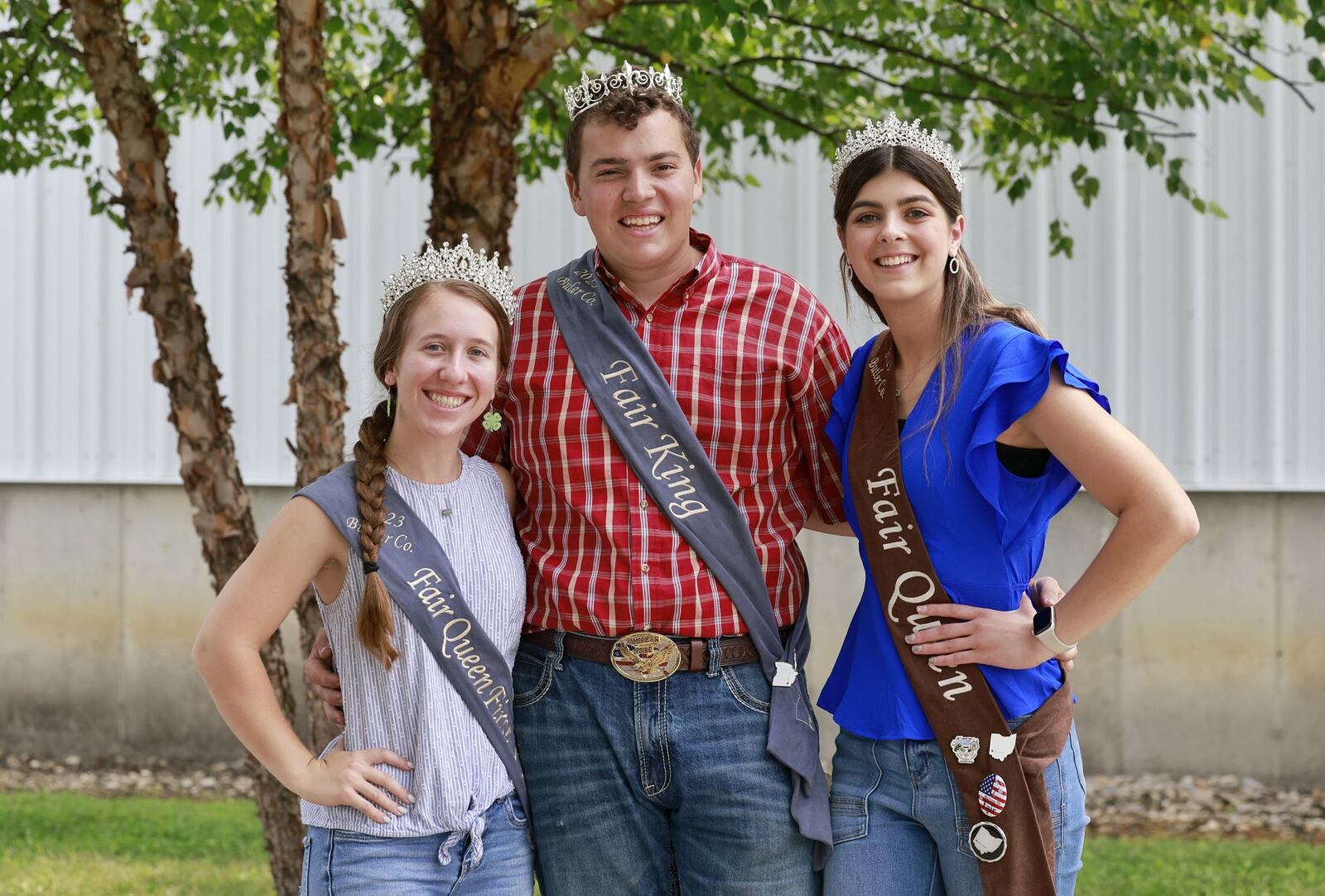 Butler County Fair Queen runner up LeAnn Niederman, left, King Ryland Beckner, middle, and Queen Alyssa Thompson will make appearances at many events during Butler County Fair in Hamilton. NICK GRAHAM/STAFF