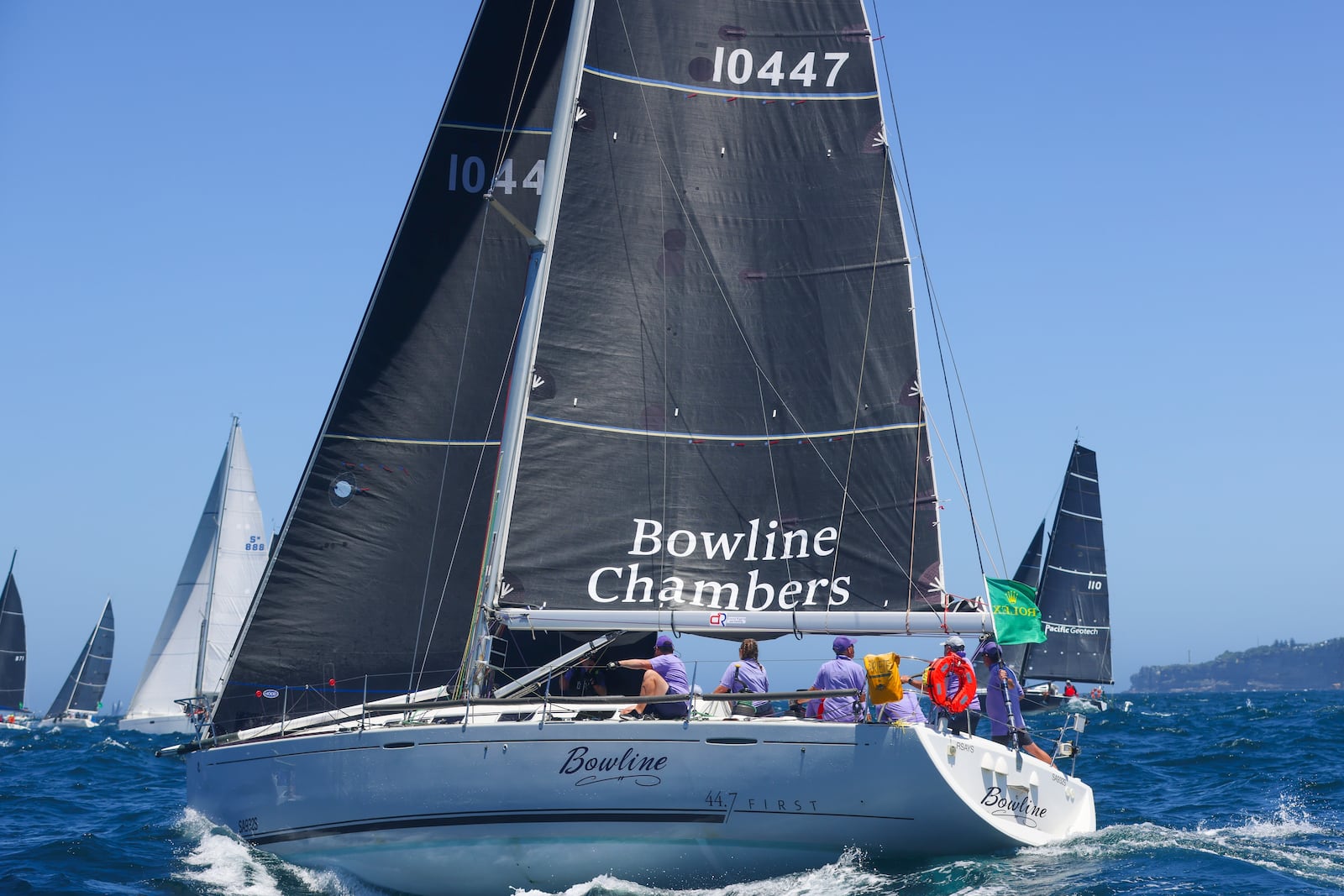 Bowline sails out of the heads following the start of the Sydney to Hobart yacht race in Sydney, Thursday, Dec. 26, 2024. (Paul Bramble/Rolex via AP)