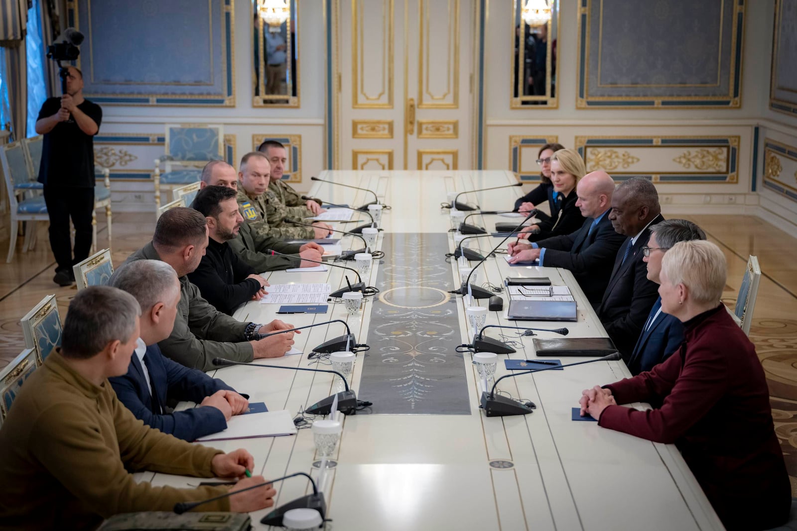 In this photo provided by the Press Service Of The President Of Ukraine on October 21, 2024, U.S. Secretary of Defense Lloyd Austin, centre right, and Ukraine's President Volodymyr Zelenskyy, centre left, attend their meeing in Kyiv, Ukraine. (Press Service Of The President Of Ukraine via AP)