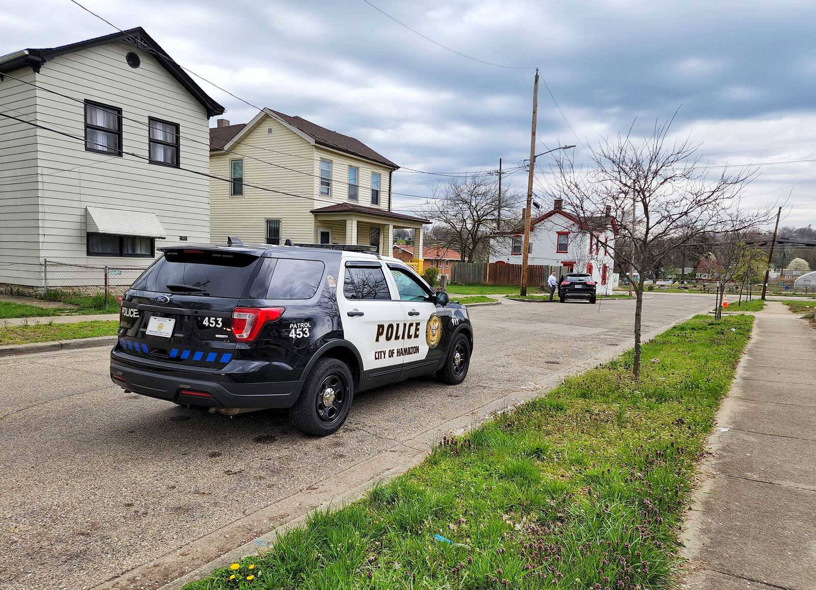 Hamilton Police on Wilson Street this morning where a man said he he was shot then drove to the police station. NICK GRAHA,/STAFF