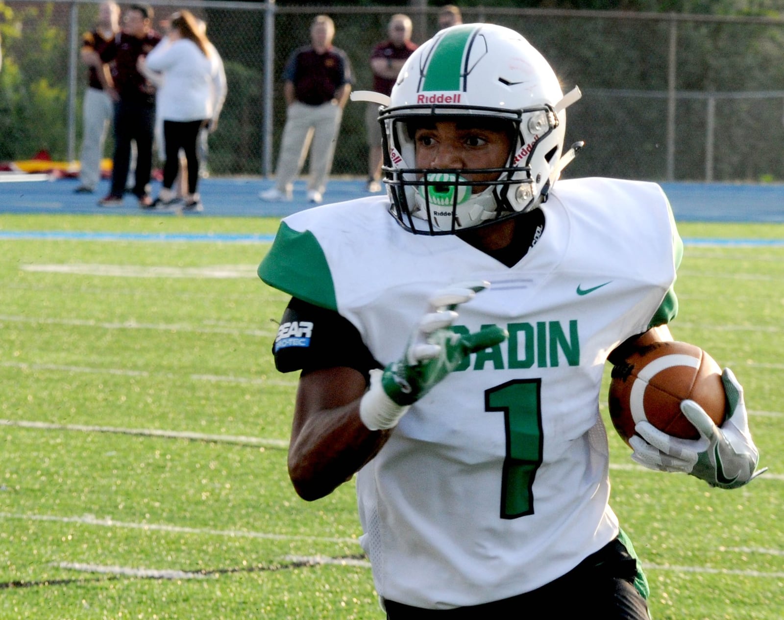 Badin’s Davon Starks finds some running room during the first quarter of the Rams’ season opener against Ross on Friday night in the Skyline Chili Crosstown Showdown at Hamilton’s Virgil Schwarm Stadium. Starks scored three touchdowns as Badin won 36-6. CONTRIBUTED PHOTO BY DAVID A. MOODIE