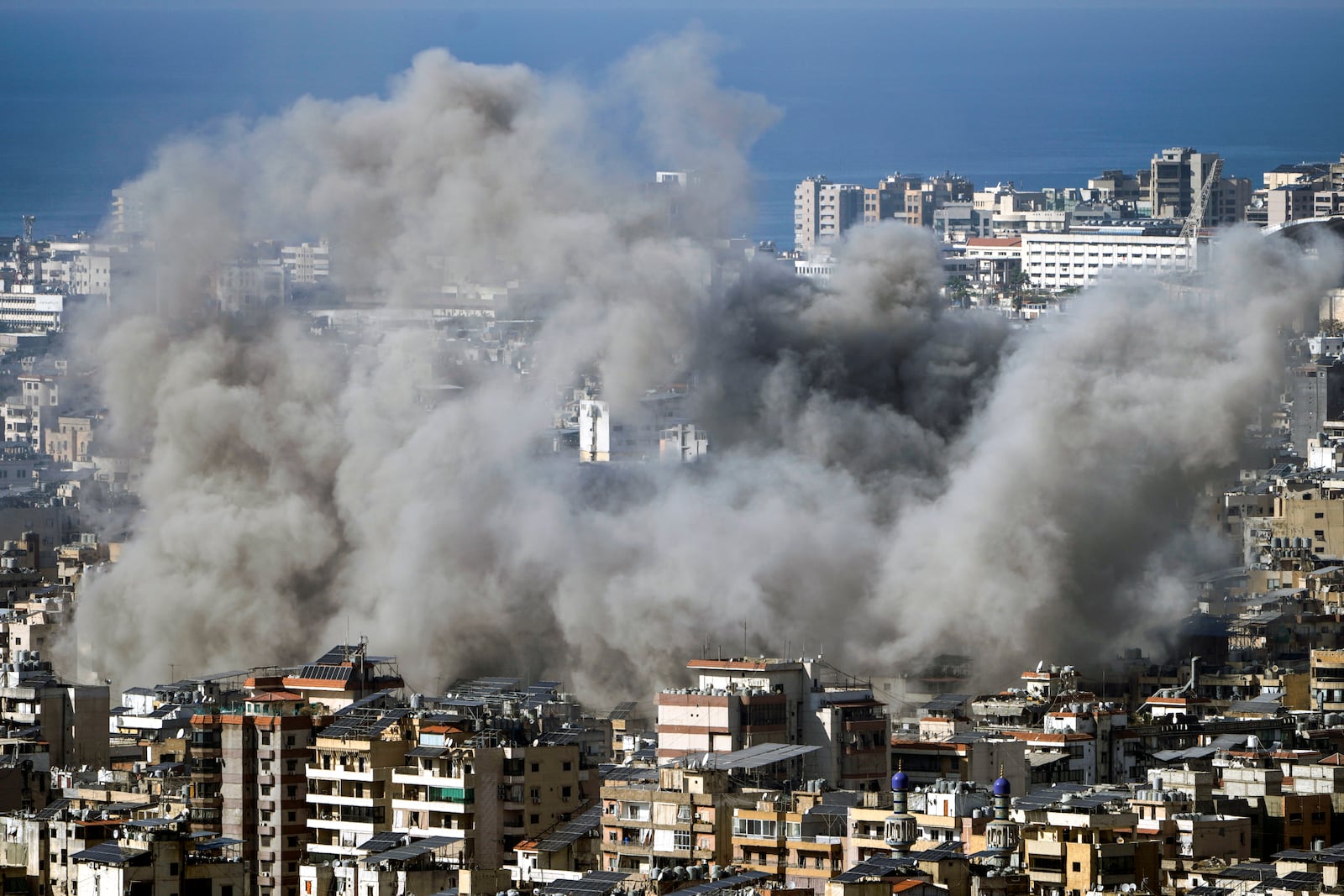 Smoke rises after an Israeli airstrike on Dahiyeh, in the southern suburb of Beirut, Lebanon, Saturday, Nov. 16, 2024. (AP Photo/Bilal Hussein)