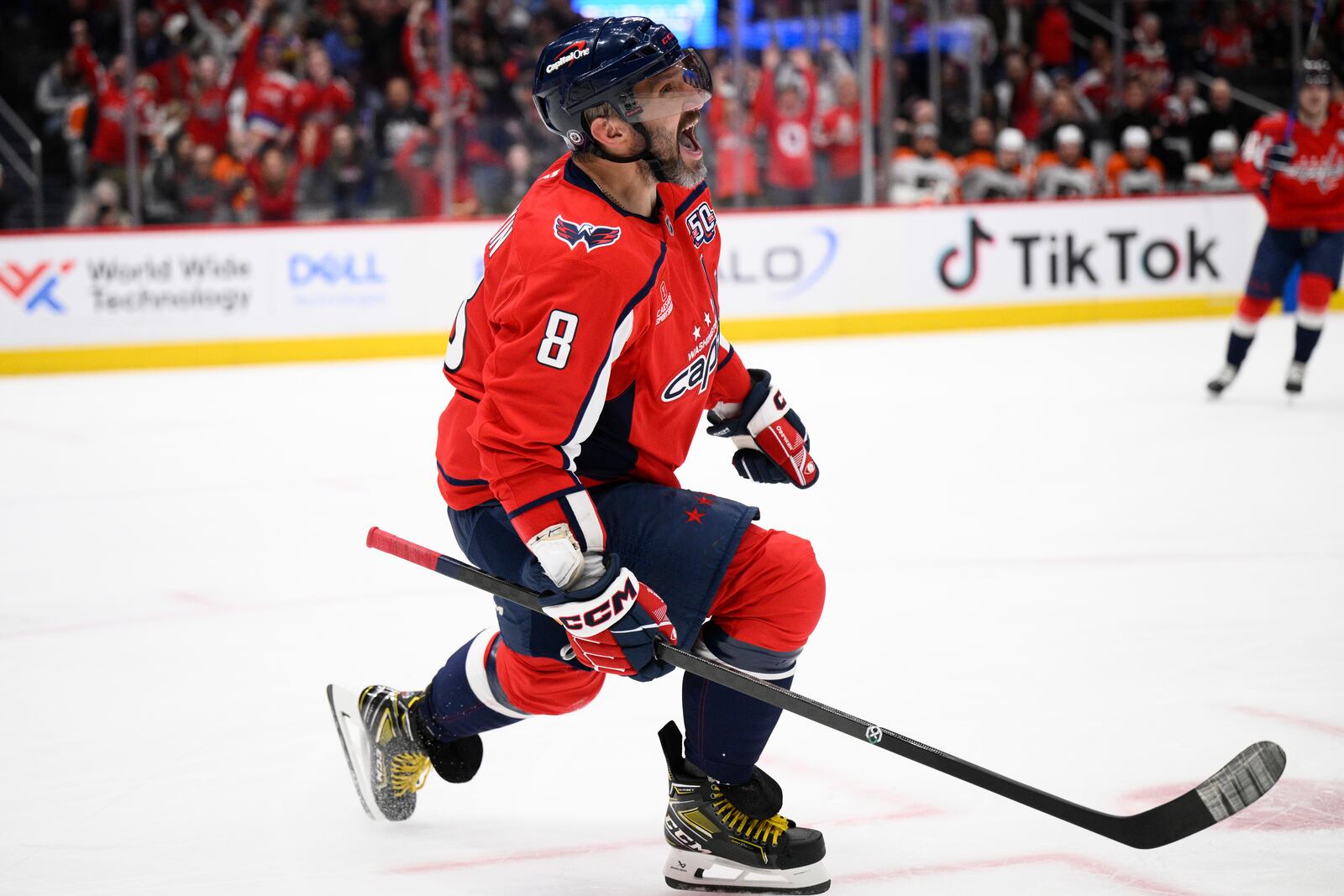 Washington Capitals left wing Alex Ovechkin (8) celebrates his goal during the first period of an NHL hockey game against the Philadelphia Flyers, Thursday, March 20, 2025, in Washington. (AP Photo/Nick Wass)