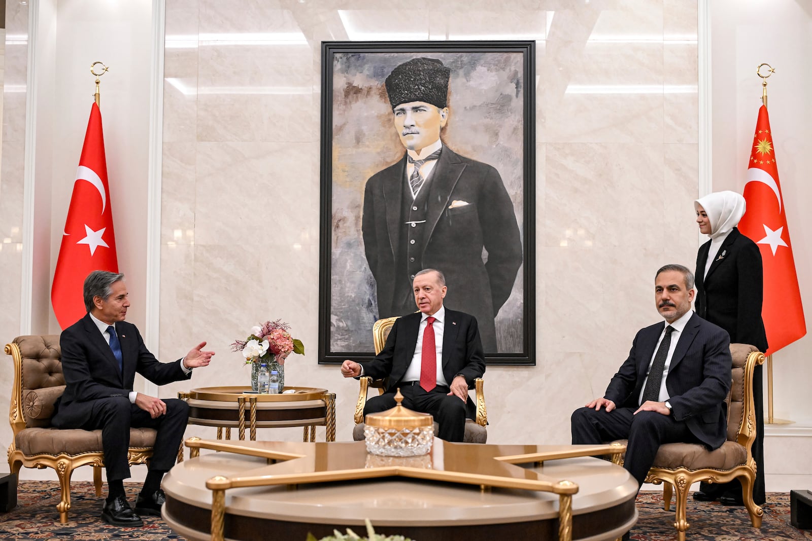 US Secretary of State Antony Blinken, left, meets with Turkey's President Recep Tayyip Erodgan, middle, and Foreign Minister Hakan Fidan, at Ankara Esenboga Airport on Dec. 12, 2024. (Andrew Caballero Reynolds, Pool Photo via AP)