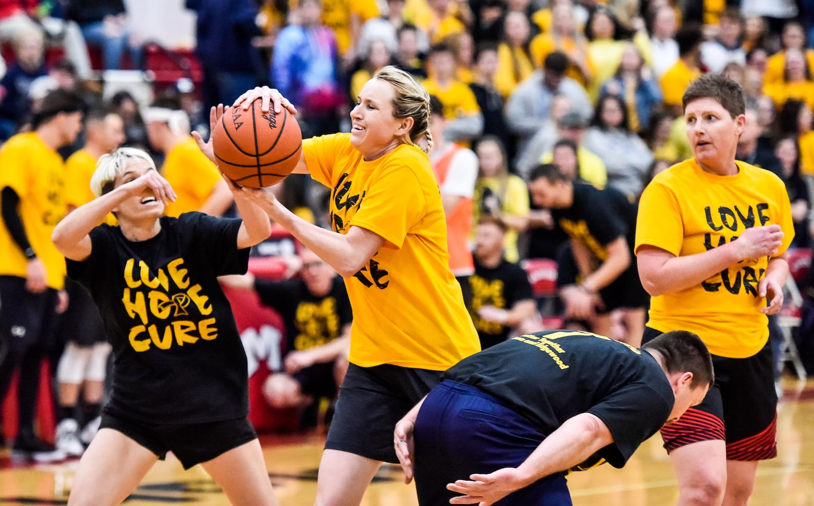 Two Butler County schools hold basketball game to benefit Madison teen battling cancer