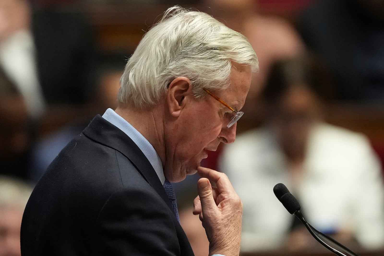 French Prime Minister Michel Barnier addresses the National Assembly prior to a vote on a no-confidence motion that could bring him down and his cabinet for the first time since 1962, Wednesday, Dec. 4, 2024 in Paris. (AP Photo/Michel Euler)