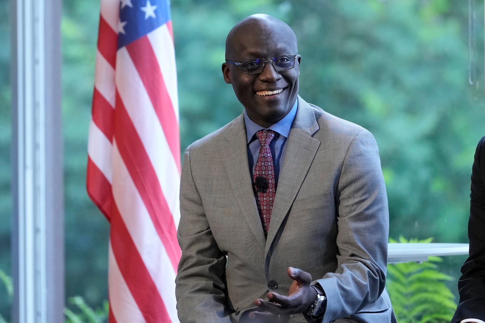 Ambassador Philip Thigo, Special Envoy on Technology for the Office of the President of Kenya, speaks on a panel at the convening of the International Network of AI Safety Institutes at the Golden Gate Club at the Presidio in San Francisco, Wednesday, Nov. 20, 2024. (AP Photo/Jeff Chiu)