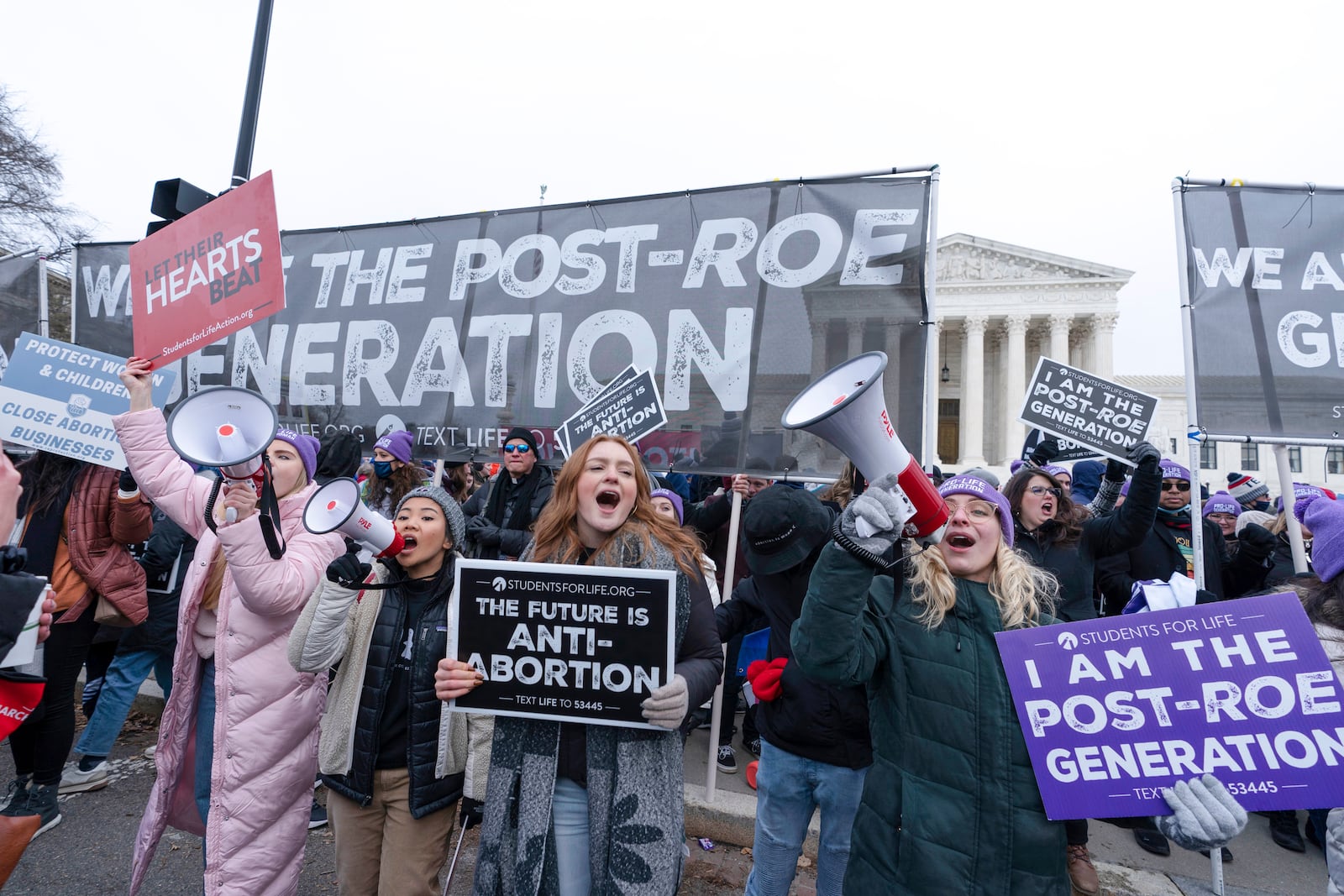 FILE - Anti-abortion activists march outside of the U.S. Supreme Court during the annual March for Life in Washington, Friday, Jan. 21, 2022. (AP Photo/Jose Luis Magana, File)