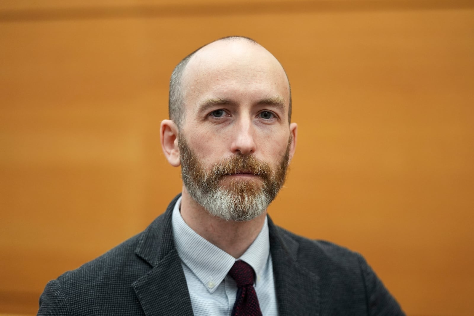 Michigan State University Associate Professor of Law Justin Simard poses in the School of Law Moot Court, Tuesday, Feb. 18, 2025 in East Lansing, Mich. (AP Photo/Paul Sancya)